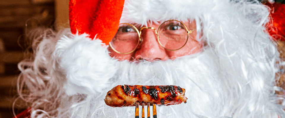 Santa with a sausage smile